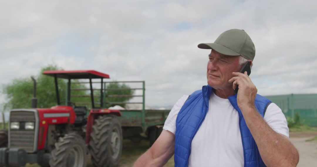 Senior Farmer Talking on Mobile Phone at Farm - Free Images, Stock Photos and Pictures on Pikwizard.com