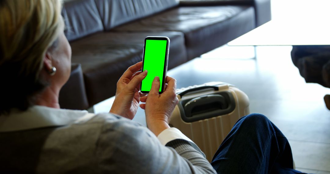 Traveler Rampage Communicates Using Smartphone at Busy Port