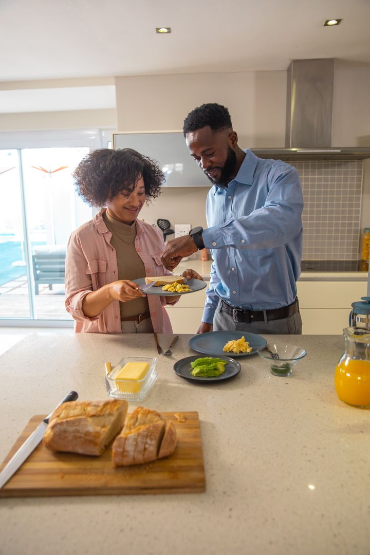 Couple Enjoying Breakfast Together in Modern Kitchen Setting