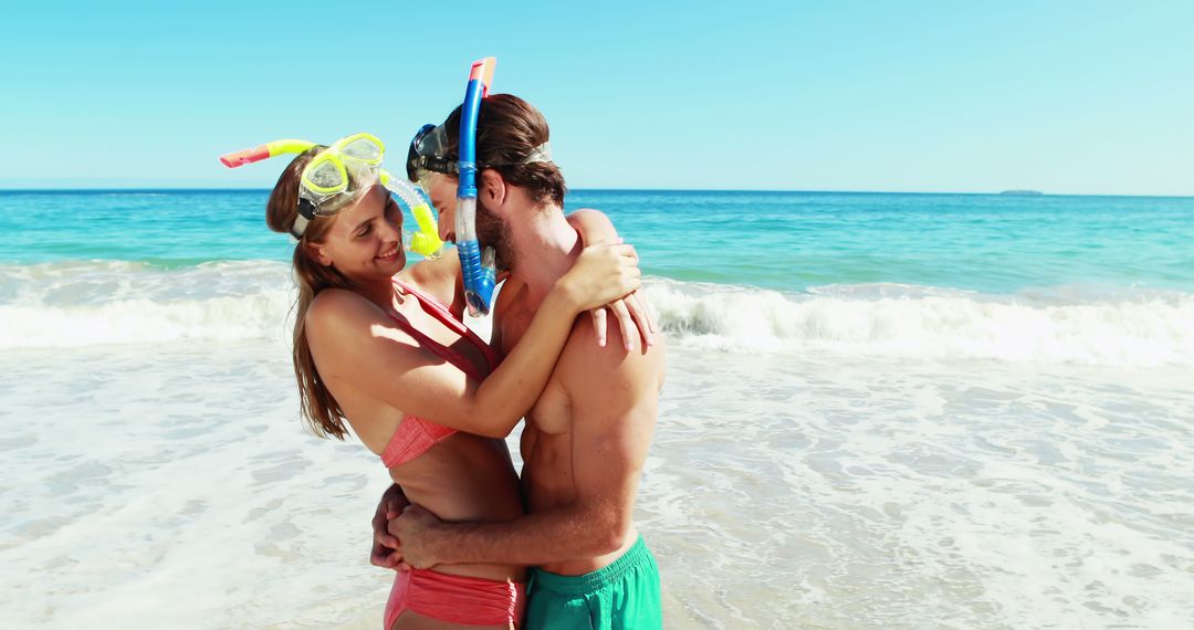 Romantic Couple in Snorkeling Gear Embracing on Tropical Beach - Free Images, Stock Photos and Pictures on Pikwizard.com