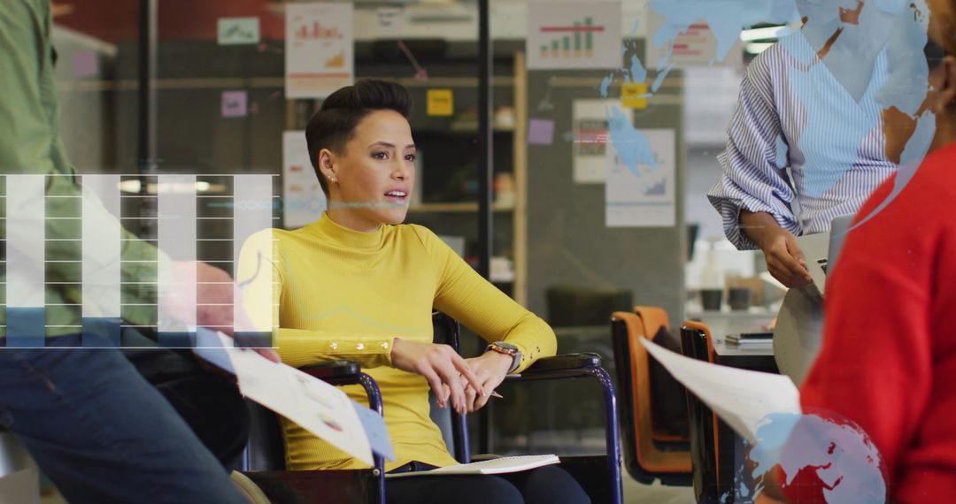 Creative Team Discussing Financial Data in Modern Office