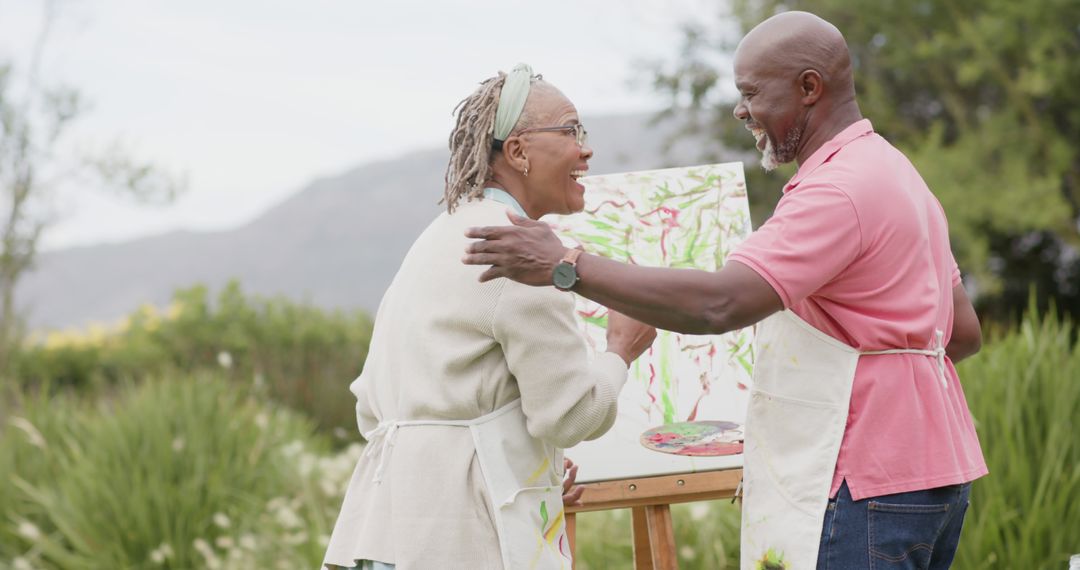 Senior Couple Enjoying Outdoor Painting Activity Together - Free Images, Stock Photos and Pictures on Pikwizard.com