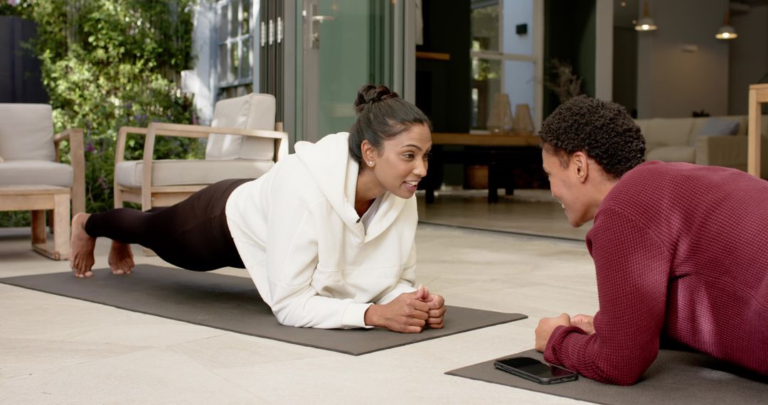 Multicultural Friends Practicing Plank Outdoors