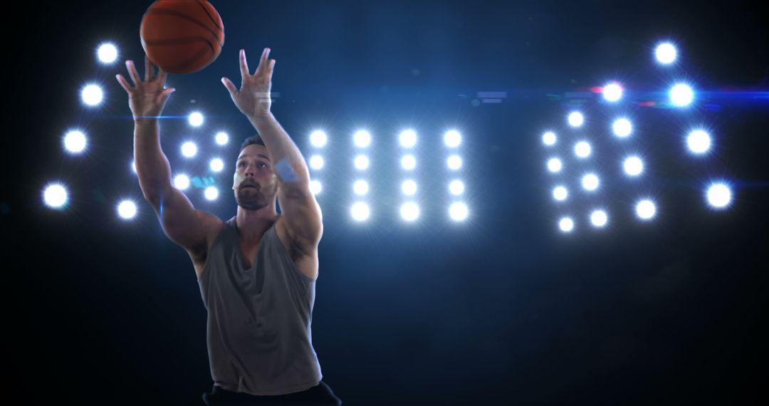 Focused Basketball Player Shooting Under Spotlight