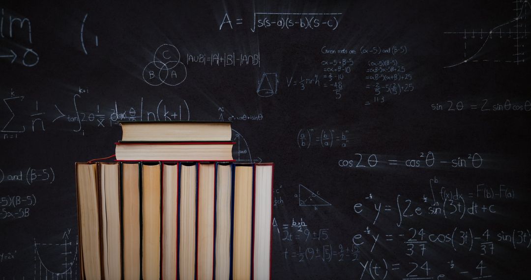 Books in Front of Mathematical Equations on Blackboard - Free Images, Stock Photos and Pictures on Pikwizard.com