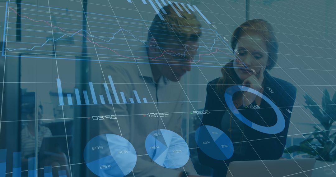 Coworkers Analyzing Digital Data with Overlayed Graphs in Modern Office