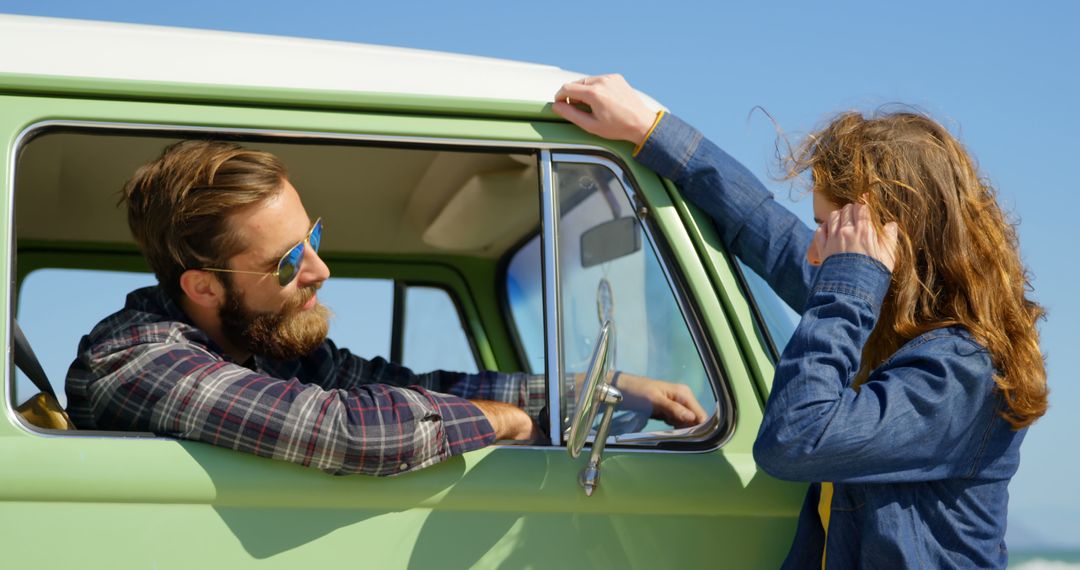 Couple Interacting by Hippie Van on Sunny Road Trip - Free Images, Stock Photos and Pictures on Pikwizard.com