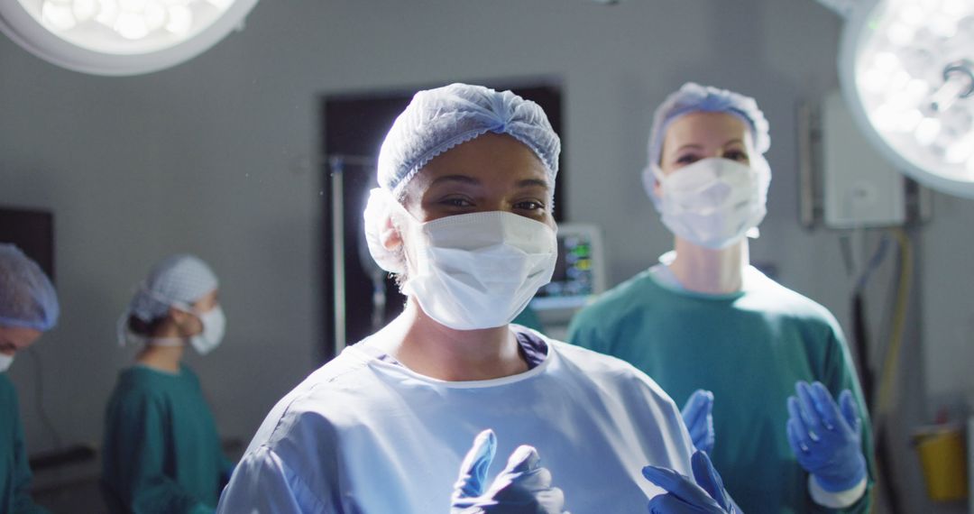 Confident Medical Team in Surgical Room Preparing for Operation - Free Images, Stock Photos and Pictures on Pikwizard.com