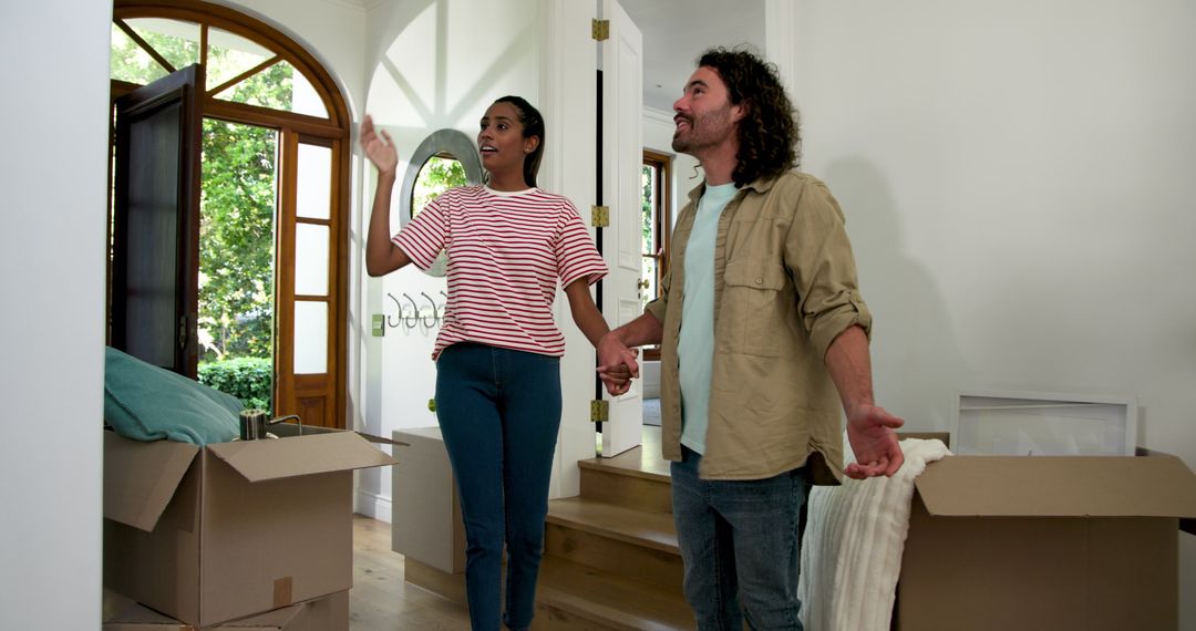 Excited couple touring new home together