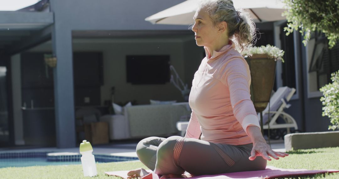 Senior Woman Practicing Yoga on Patio - Free Images, Stock Photos and Pictures on Pikwizard.com