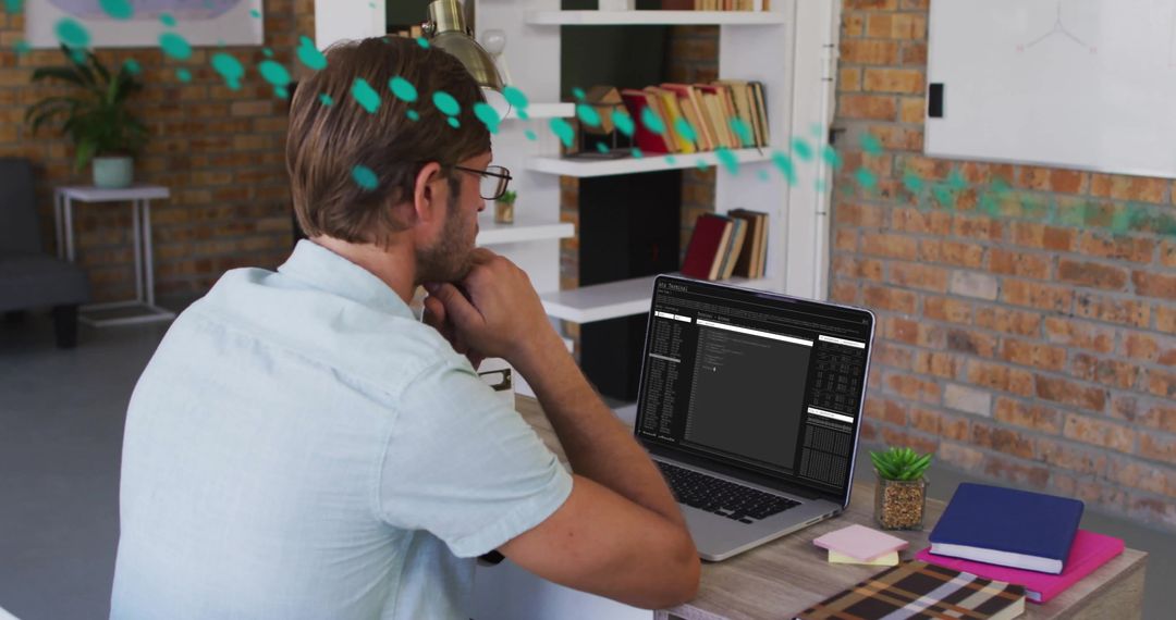 Businessman Analyzing Data on Laptop with Internet Connections Concept