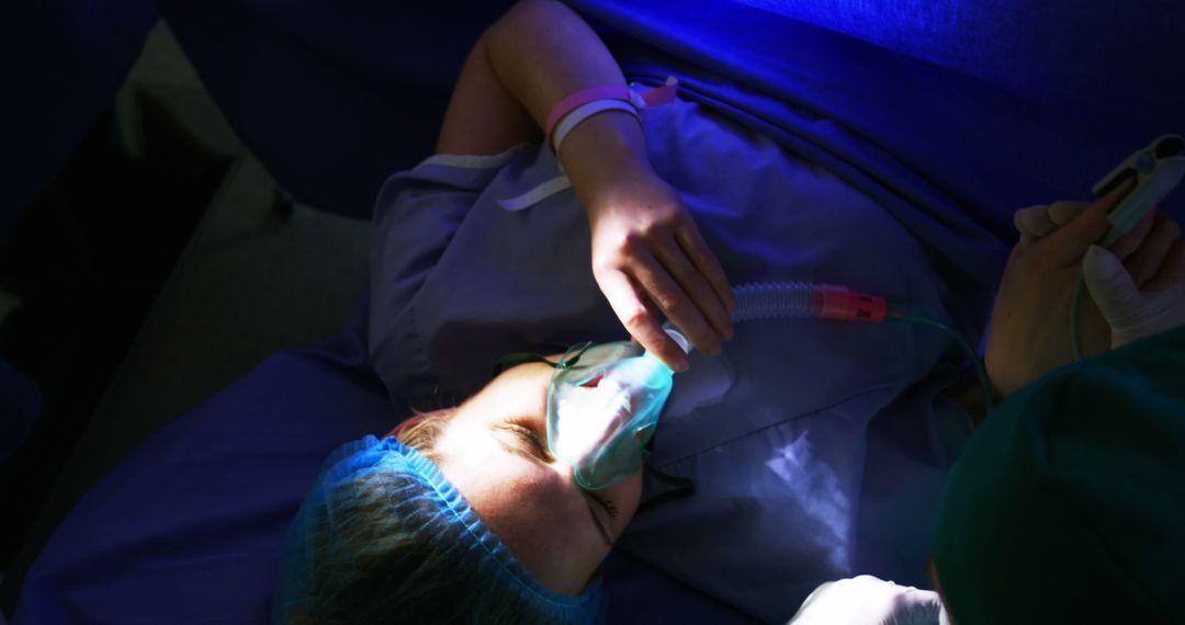 Patient Undergoing Surgery Wearing Oxygen Mask - Free Images, Stock Photos and Pictures on Pikwizard.com