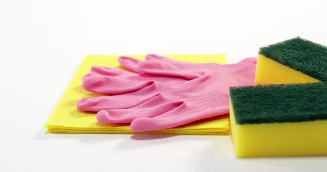 House Cleaning Tools with Pink Rubber Gloves and Yellow Sponge - Free Images, Stock Photos and Pictures on Pikwizard.com