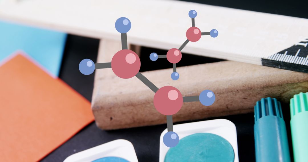 Colorful Markers and Molecular Model on School Desk for Studying