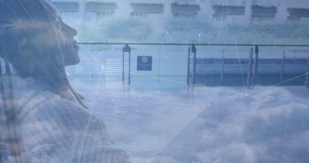 Futuristic Network Concept with Businesswoman Overlapping Cityscape