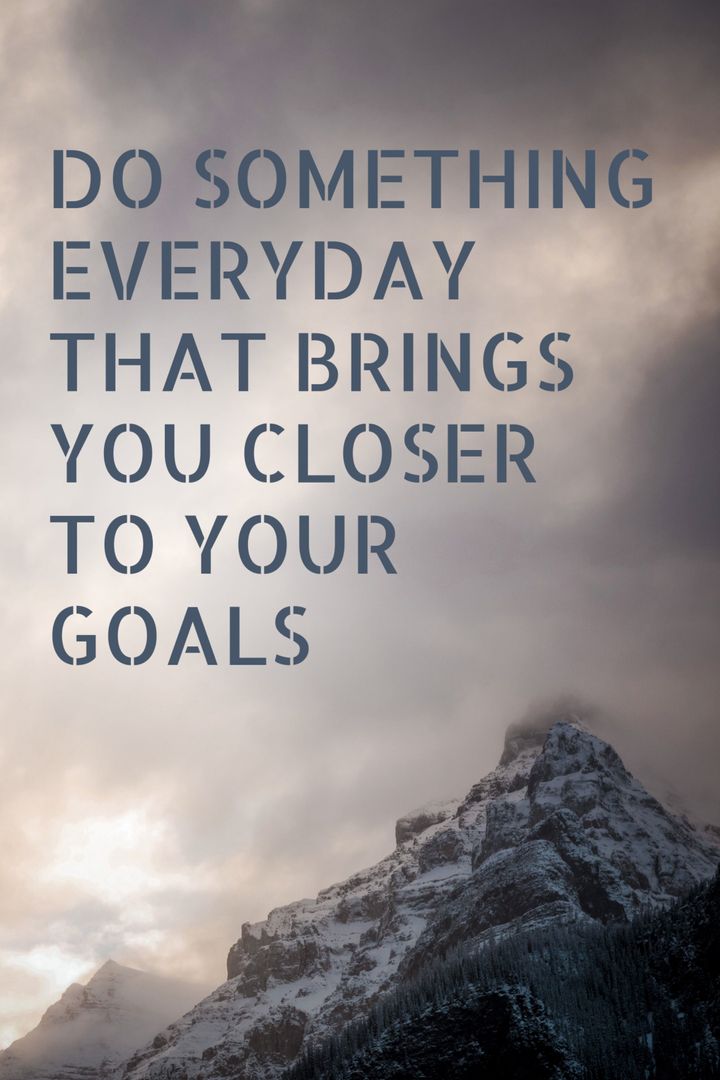 Majestic Mountain with Inspirational Quote on Achieving Goals