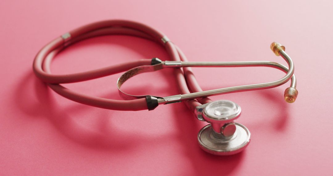 Image of stethoscope lying on pink background - Free Images, Stock Photos and Pictures on Pikwizard.com