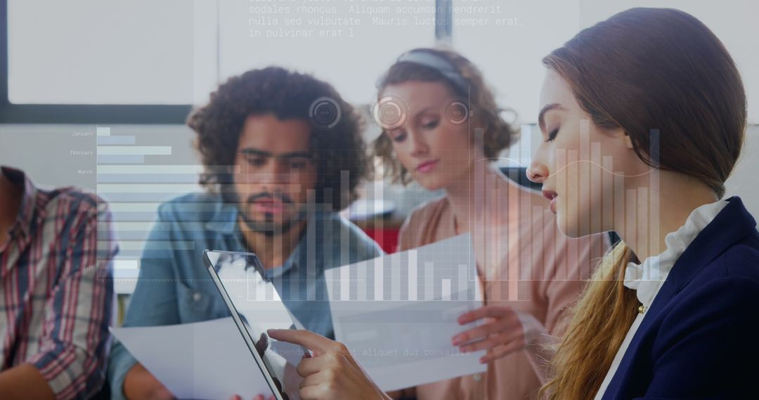 Diverse Team Engaged in Business Report Analysis with Digital Data Graphics