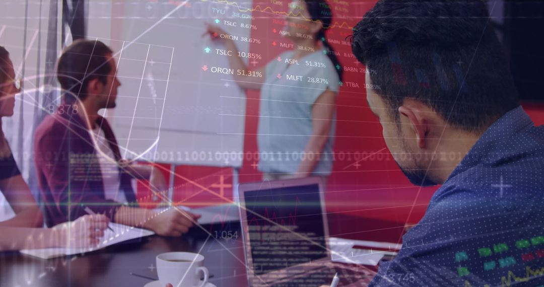 Diverse Group Collaborating in High-Tech Office with Digital Data Visualization