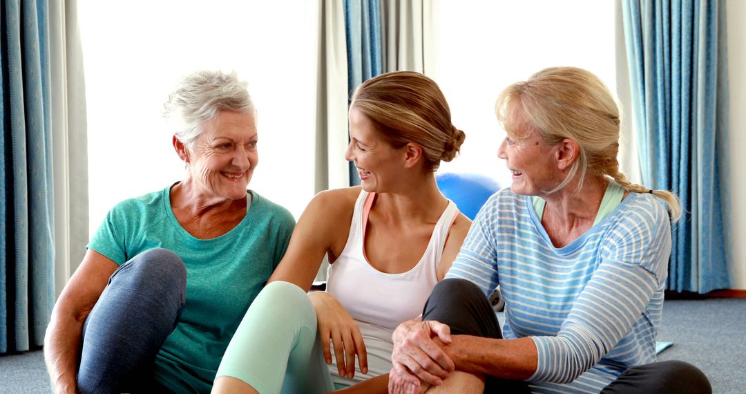 Energetic Women Smiling During Fitness Class - Free Images, Stock Photos and Pictures on Pikwizard.com