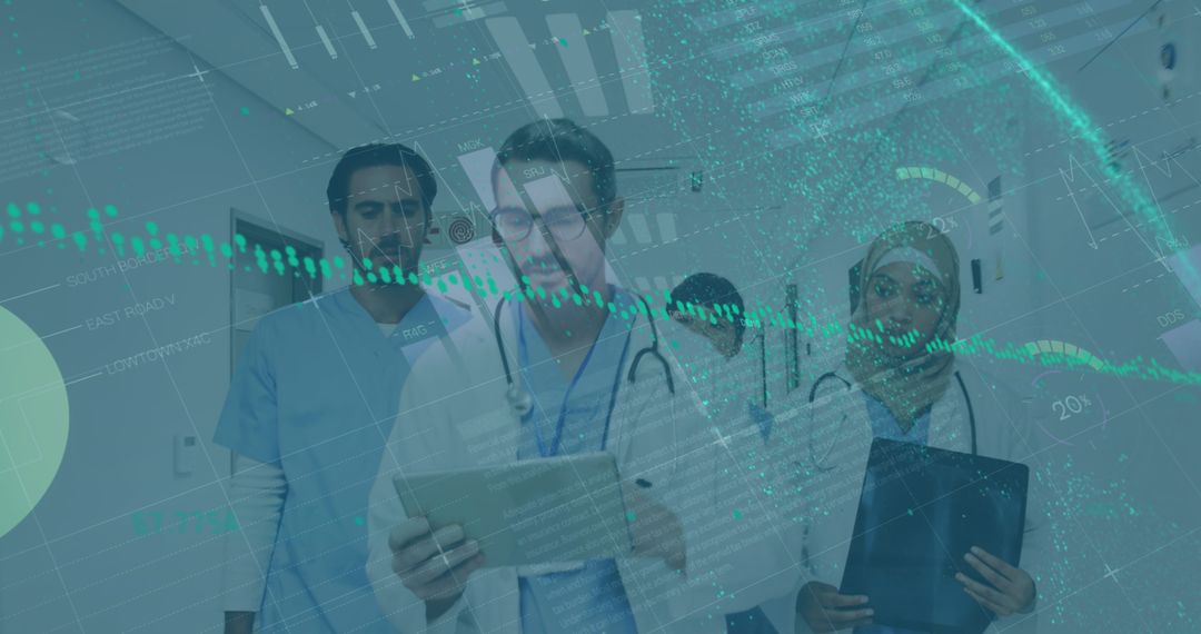 Diverse Medical Team Analyzing Data for Patient Care in Hospital Corridor