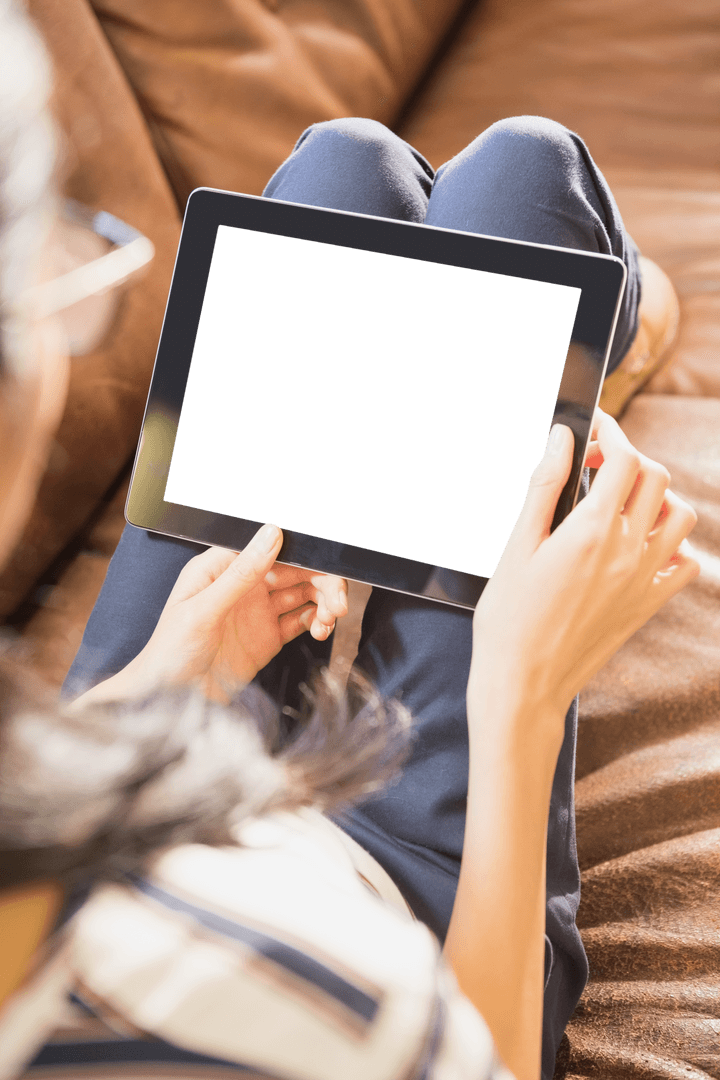 Businesswoman Relaxing with Transparent Tablet Screen on Sofa