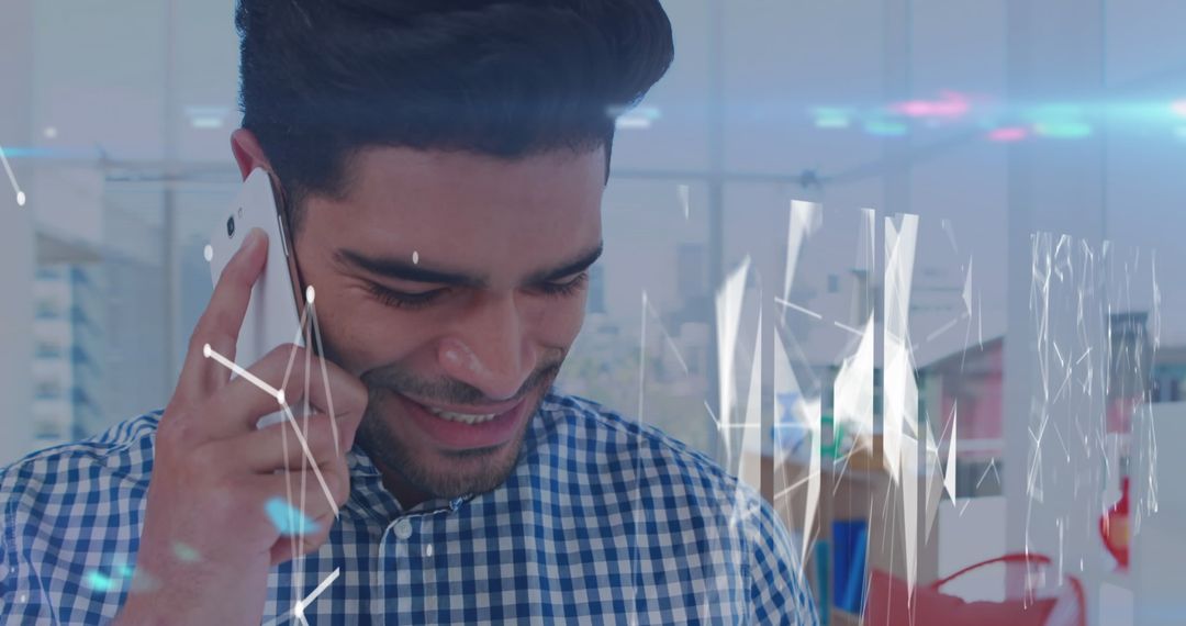 Man Engaging in Phone Conversation With Futuristic Data Overlay