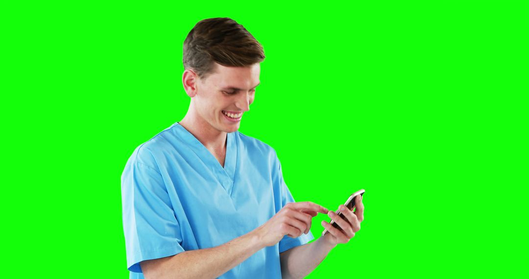 Healthcare Professional Texting on Smartphone Against Green Background - Free Images, Stock Photos and Pictures on Pikwizard.com