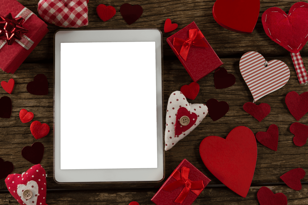 Digital Tablet with Transparent Screen Surrounded by Valentine Decorations