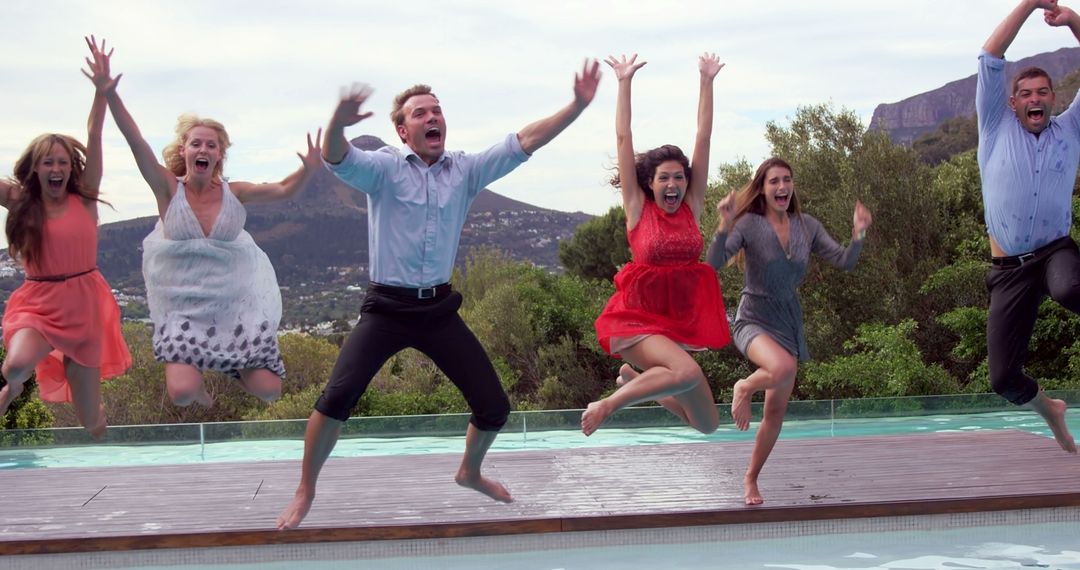 Group of Friends Jumping into Swimming Pool Outdoors - Free Images, Stock Photos and Pictures on Pikwizard.com