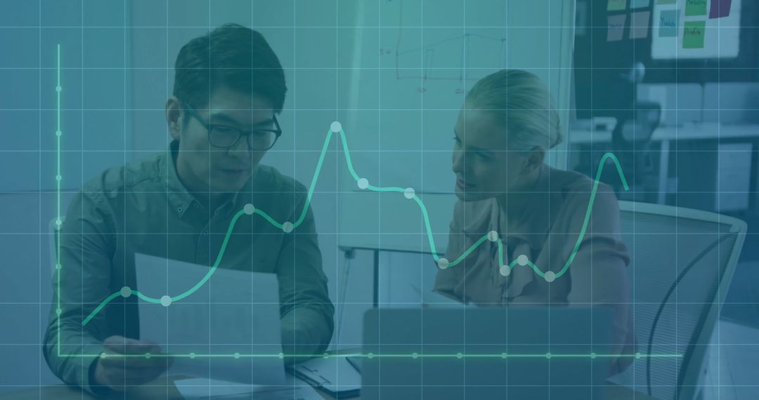 Analyzing Financial Data with Diverse Business Team in Office