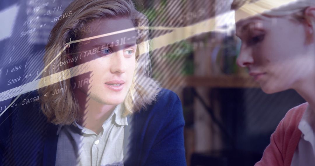 Team Collaborating on Code in Modern Workspace