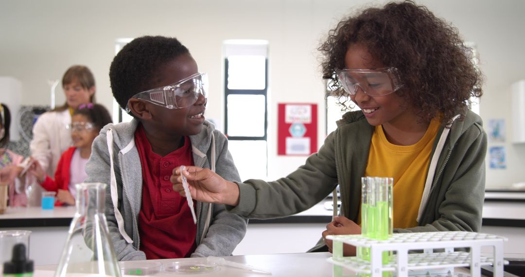 Diverse Boys Experimenting with Green Liquid in Science Classroom