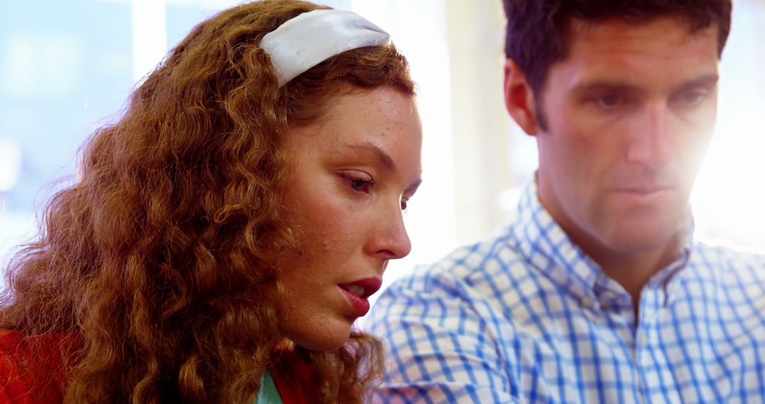 Focused Business Executives Collaborating in Office Environment