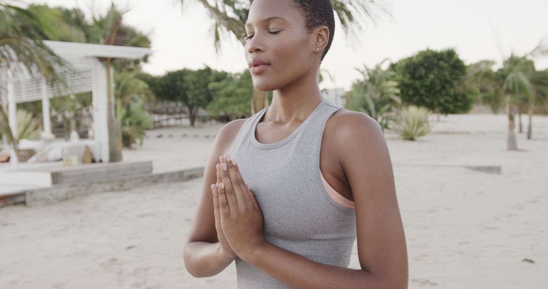 Serene Yoga Practice on a Tropical Beach Meditation - Free Images, Stock Photos and Pictures on Pikwizard.com