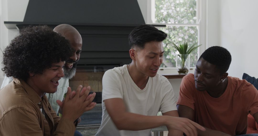 Diverse Group of Friends Enthusiastically Engaging in Planning Session