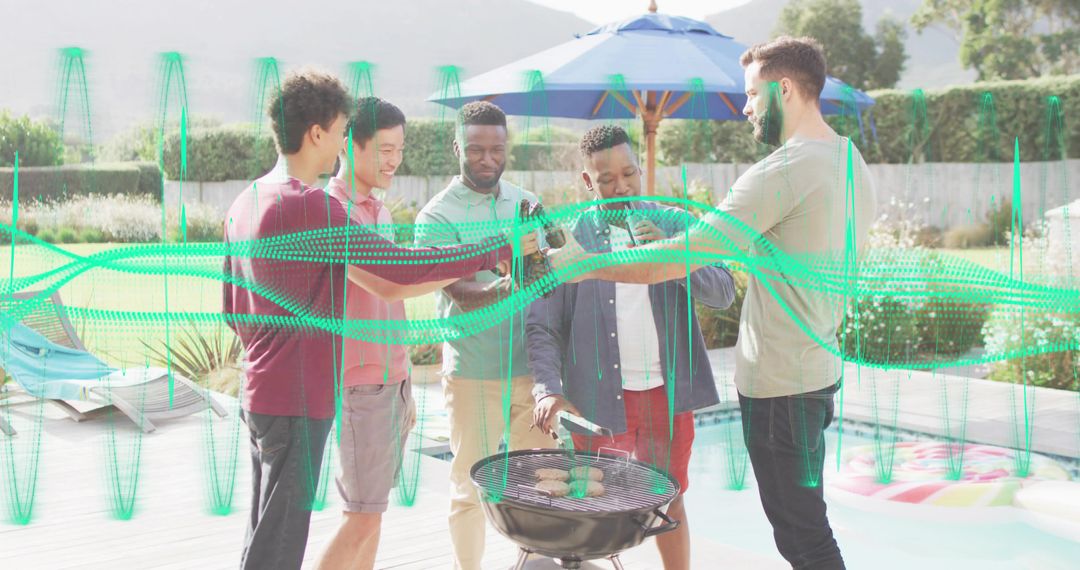 Friends toasting beers around backyard grill by pool under blue umbrella