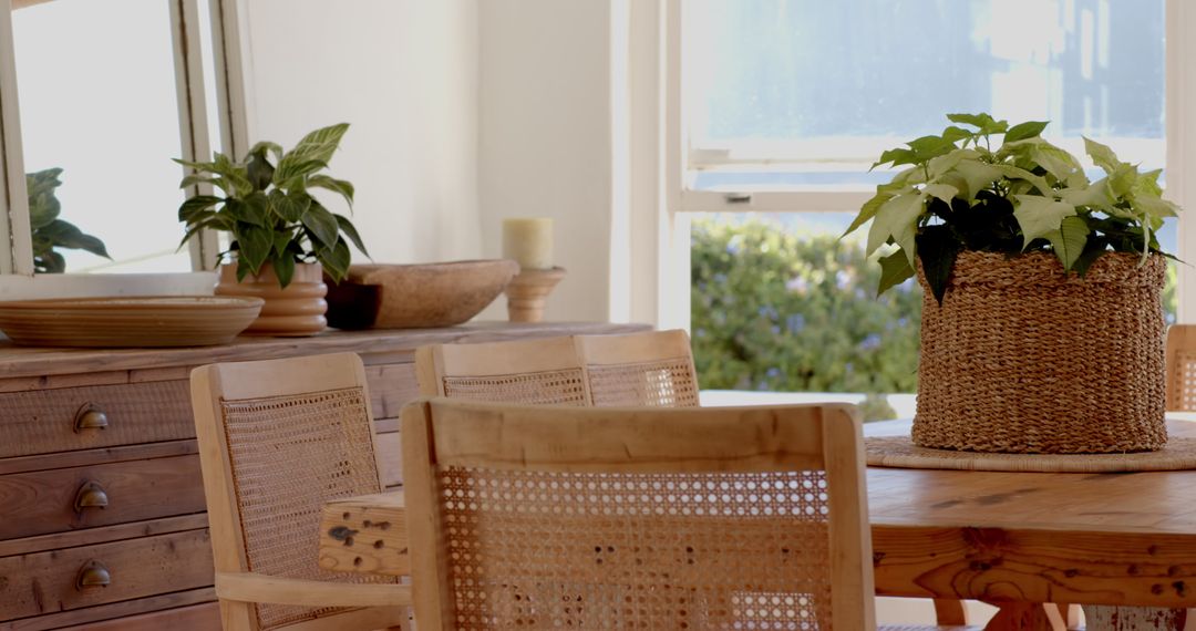 Sunlit Rustic Dining Area with Wooden Table and Rattan Chairs