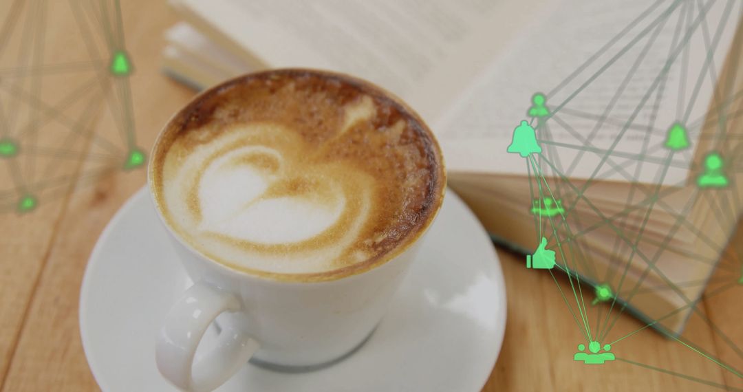 Latte with Heart and Open Book Showcasing Digital Connectivity