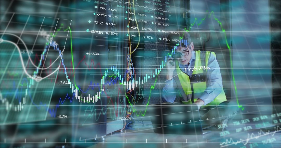 Asian Male IT Engineer Amidst Data Visualizations in Technology Center