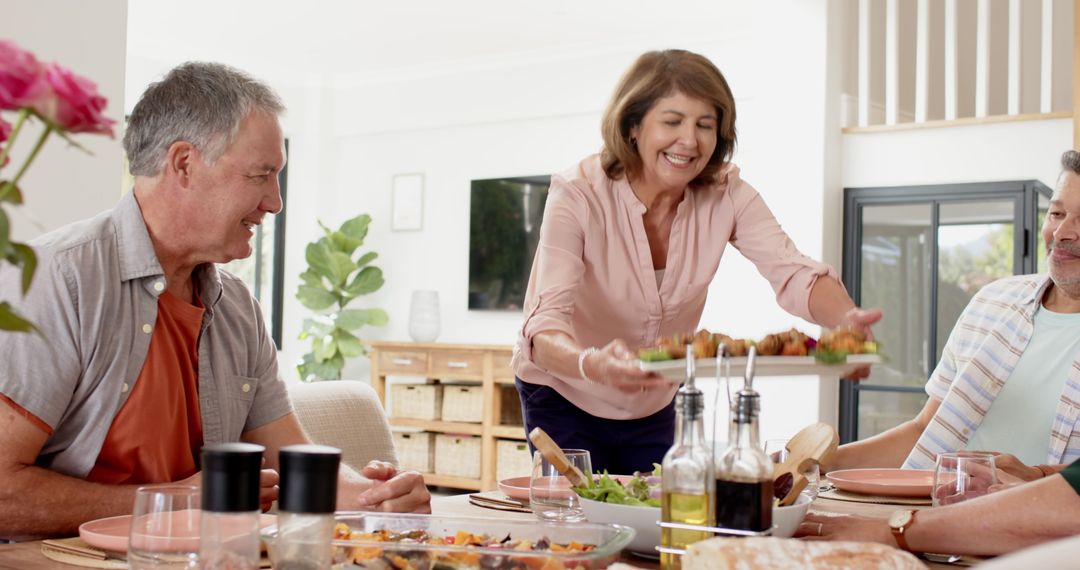Seniors Enjoying a Cozy Meal Gathering at Home