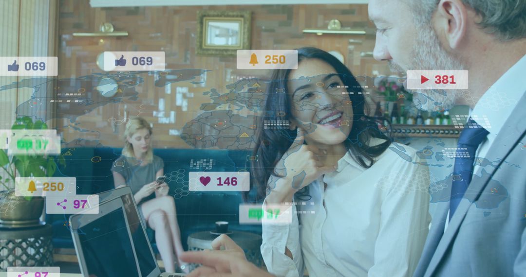 Colleagues Analyzing Digital Analytics Data in Modern Lounge Workspace