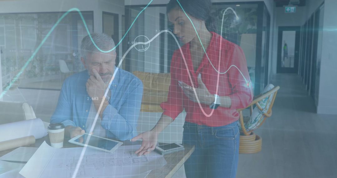 Business Professionals Analyzing Data with Virtual Graph Interface