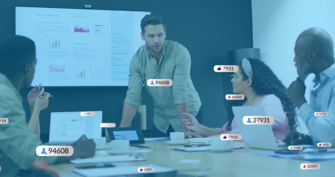 Diverse Team Meeting with Social Media Analytics in Modern Office