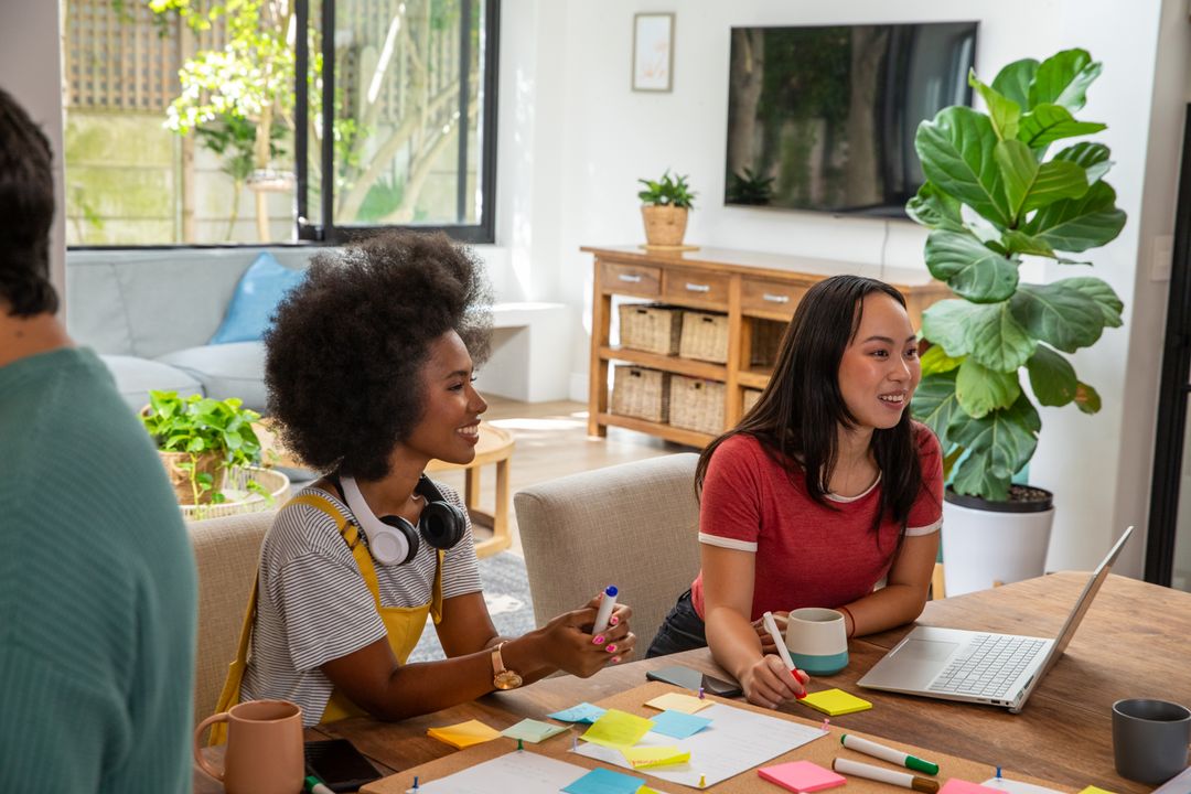 Diverse Coworkers Collaborating in Casual Workspace