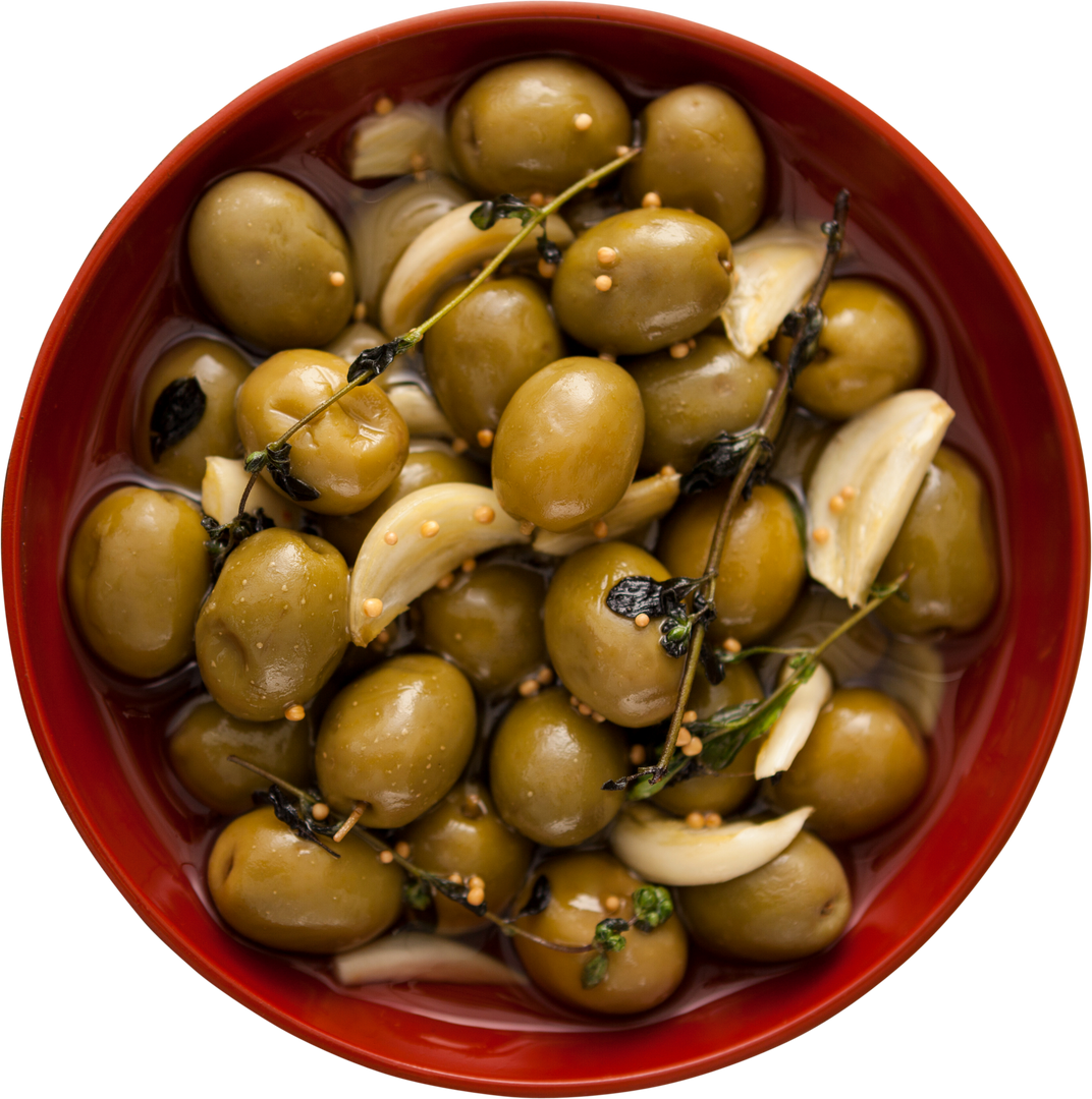 Close-Up of Green Olives with Spices and Herbs in a Transparent Bowl - Download Free Stock Images Pikwizard.com