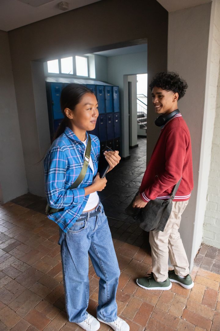 Diverse Students Engaging in Friendly Conversation at School