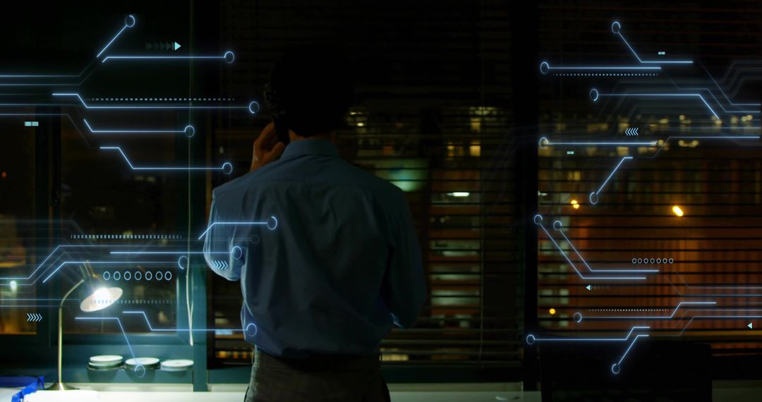 Executive standing by office window holding smartphone with holographic circuit interface