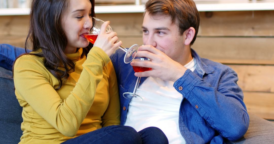 Happy Couple Enjoying Wine at Home