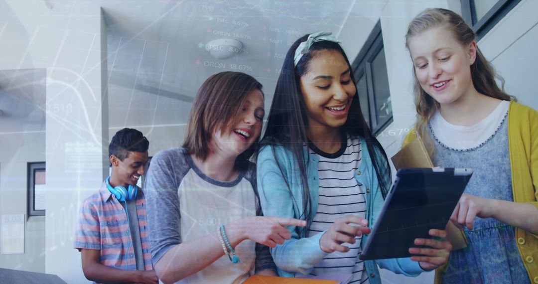 Diverse Students Engaging with Economic Data on Tablet in School